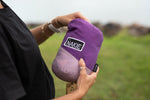 Compact purple Nakie hammock stored in its carrying bag, ideal for on-the-go relaxation in nature preview #10