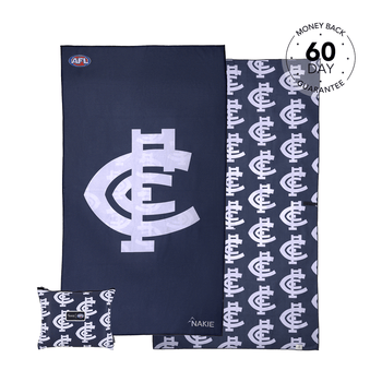 Navy AFL beach towel with large Carlton Blues logo, reversible with repeating team emblem pattern, includes small carry pouch