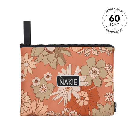 Bright studio shot of Nakie's beach towel, emphasizing its extra-large size and soft, plush texture for ultimate beach comfort